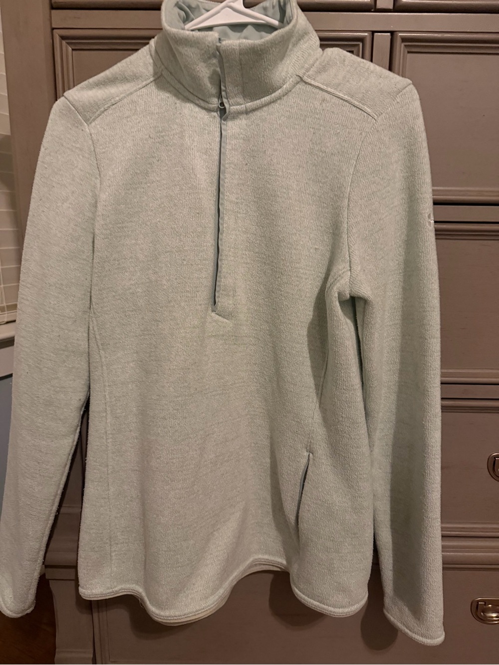 Under Armor women’s quarter zip.